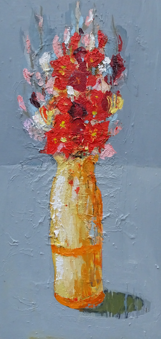 Gladiole w długim wazonie